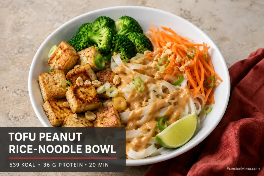 Tofu peanut rice-noodle bowl with broccoli and carrot
